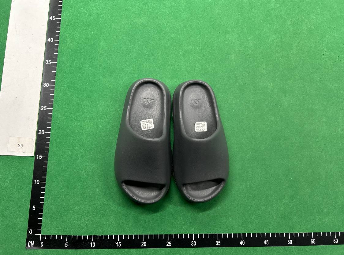 MANY YEEZY SLIDES