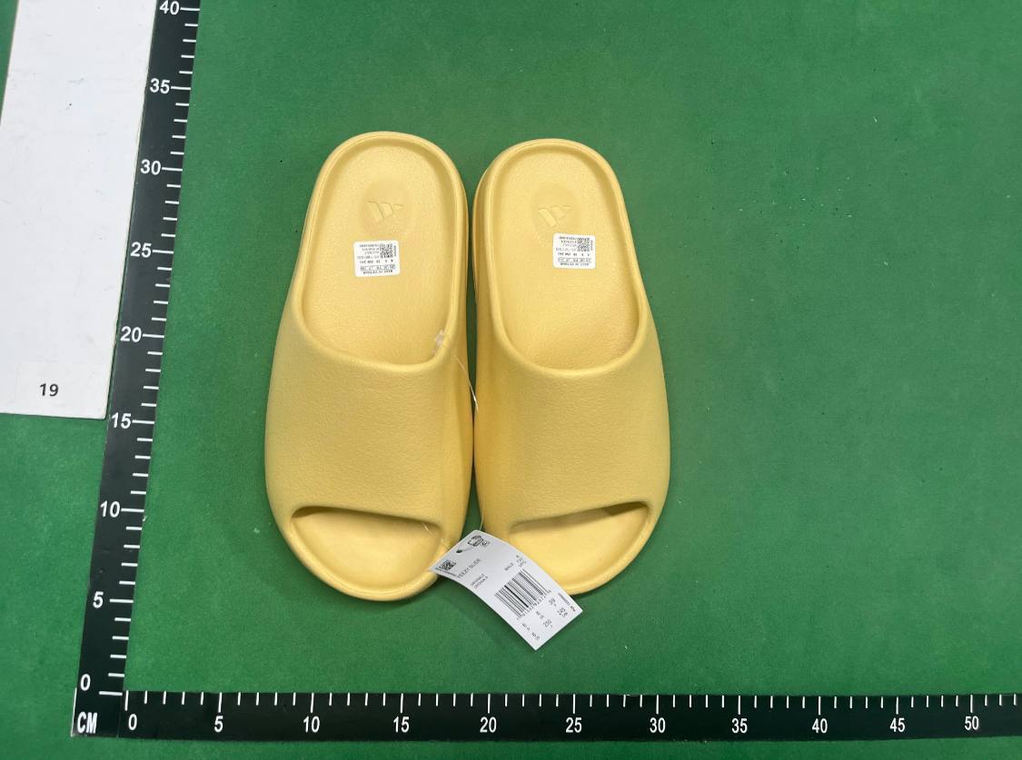 MANY YEEZY SLIDES