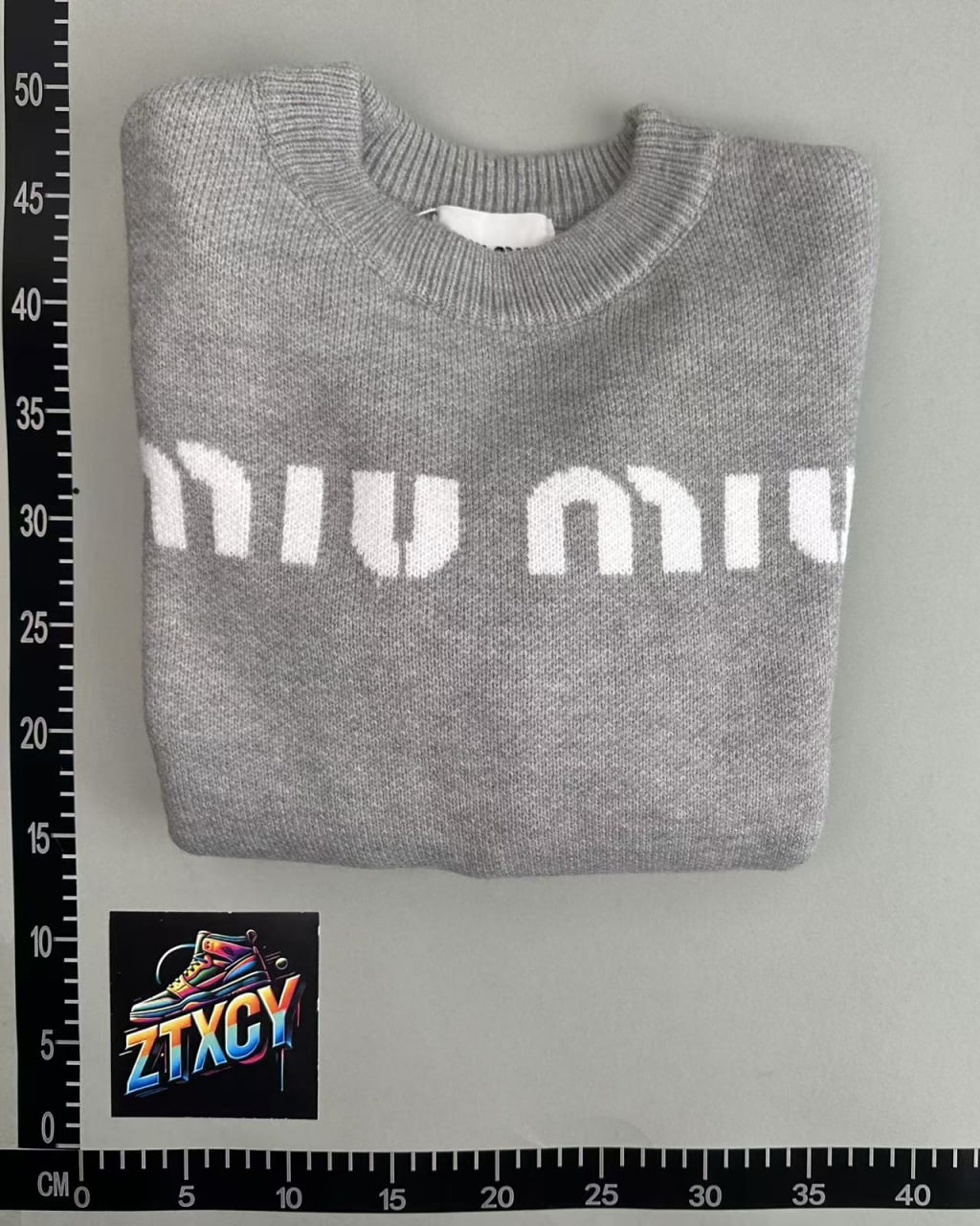 miumiu sweater